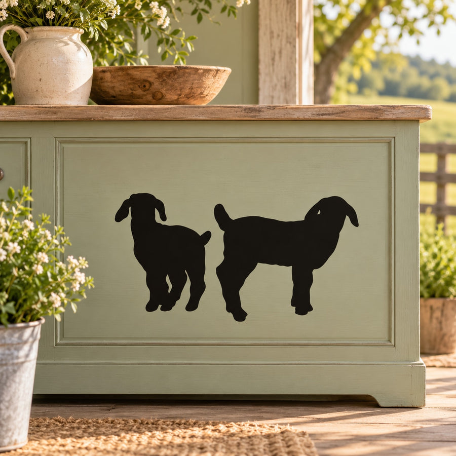 Two young Boer goat silhouette wall decal, black goats on light background