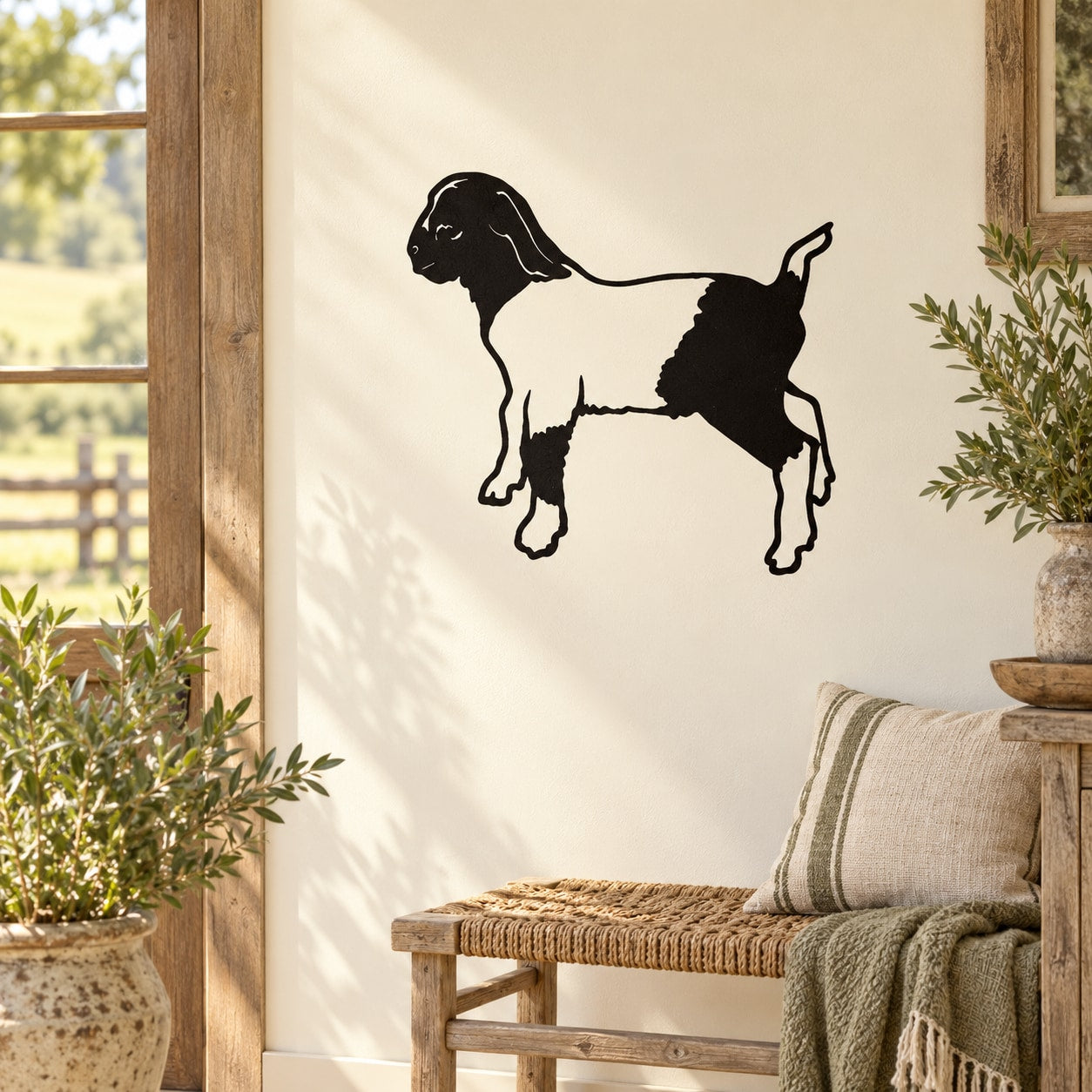 Black standing goat silhouette wall decal, head turned to the side.