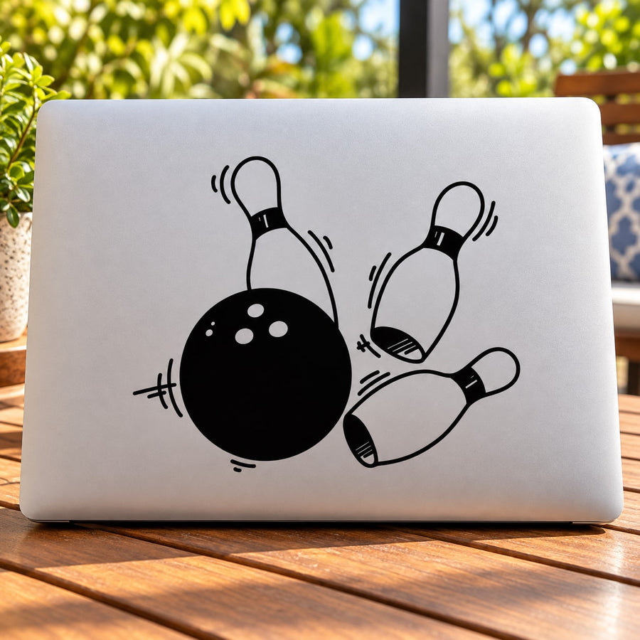 Bowling ball strike decal with black bowling pins and ball on white background