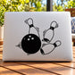 Bowling ball strike decal with black bowling pins and ball on white background