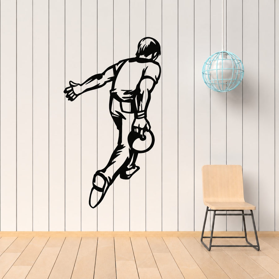 Black bowling player silhouette wall decal with arm extended and ball in hand
