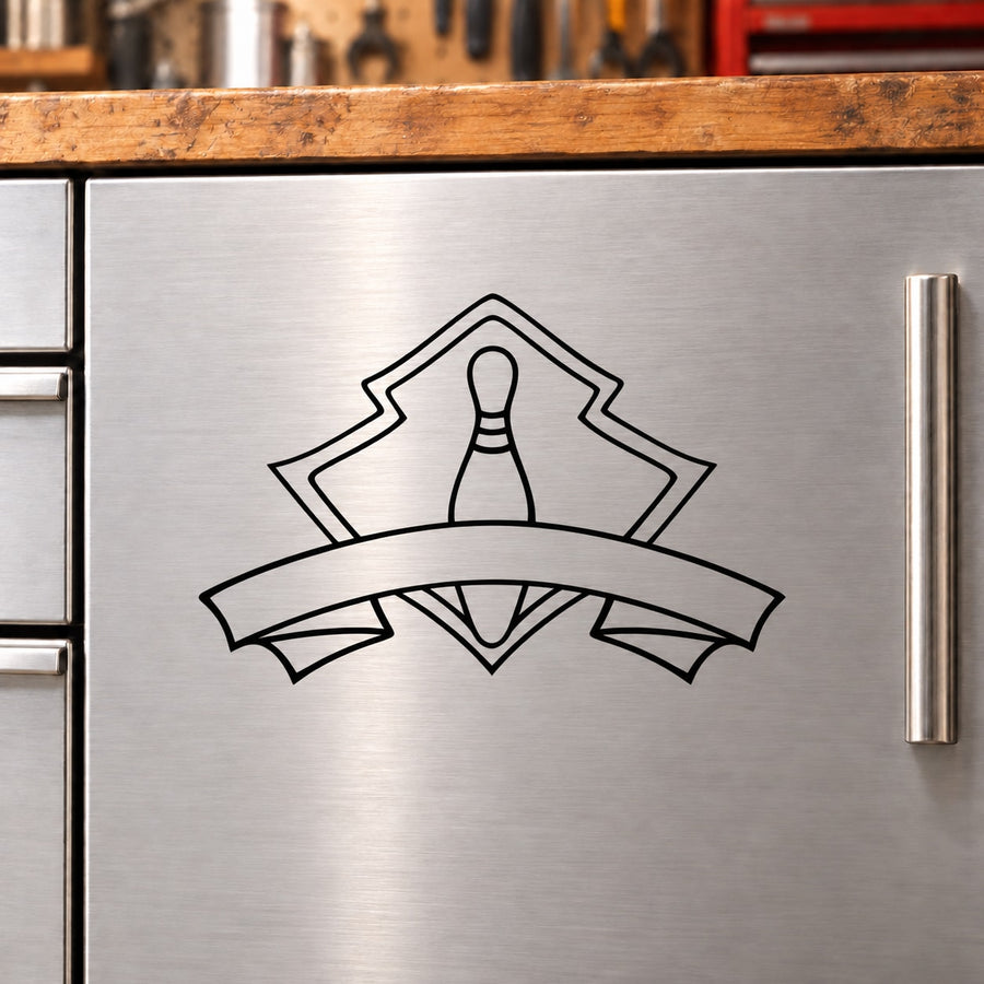 Symmetrical bowling pin crest decal with black outline on silver surface