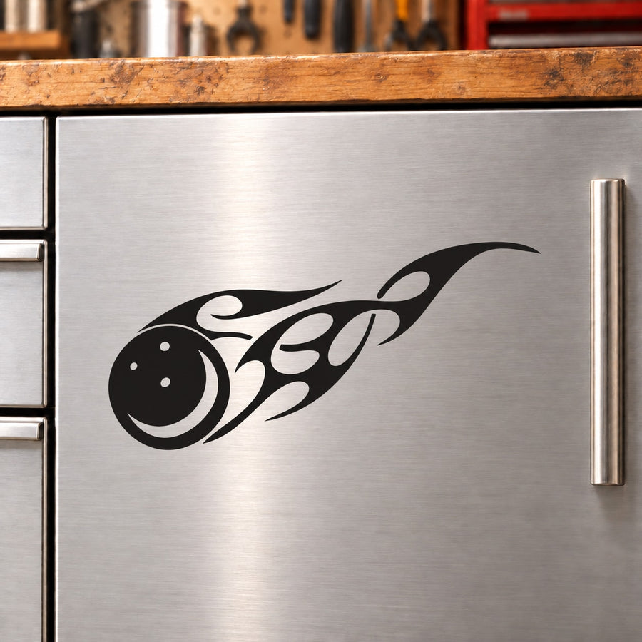 Flaming bowling ball decal in black on stainless steel door panel