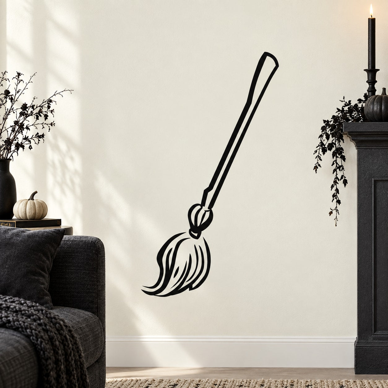 Black broomstick wall decal with outlined bristles and loop handle