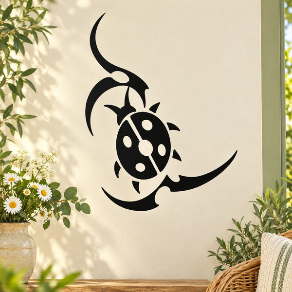 Abstract ladybug and leaf wall decal in black, curving leaf accents