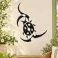 Abstract ladybug and leaf wall decal in black, curving leaf accents