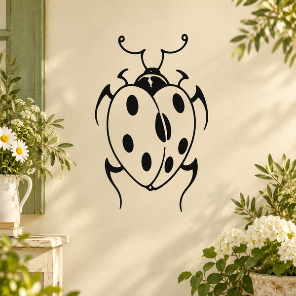 Ladybug wall decal with black outline and white body with spots