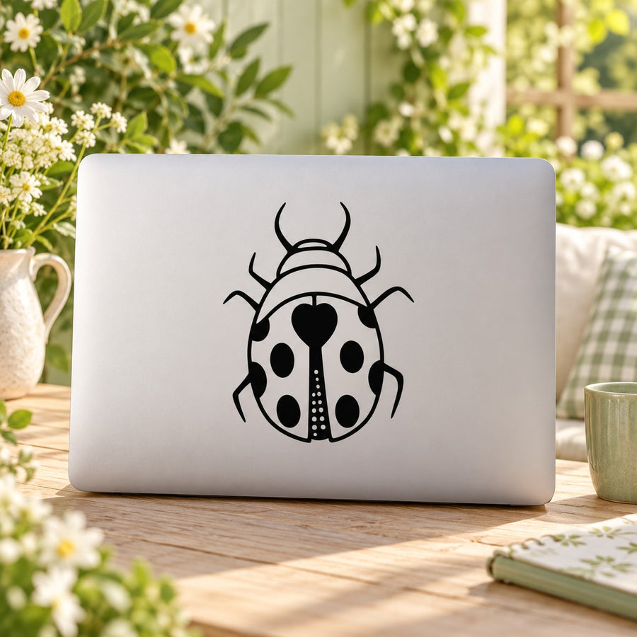 Ladybug decal with black-and-white cute ladybug illustration on a light surface