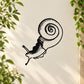 Black snail decal with spiral shell and raised antennae