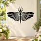 Dragonfly wing decal sticker, black symmetrical design with antenna detail on a light surface