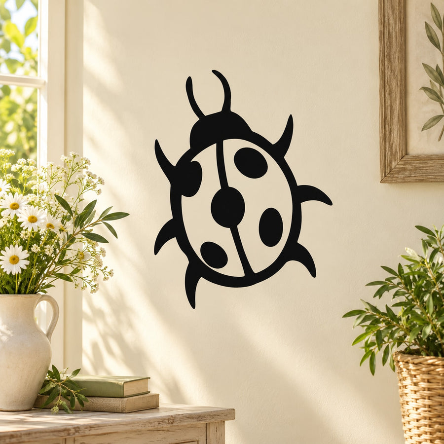 Stylized ladybug wall decal in black and white with round spots