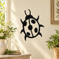 Stylized ladybug wall decal in black and white with round spots