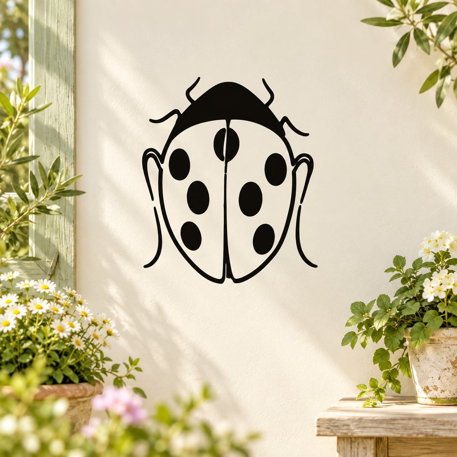 Black-and-white ladybug sitting decal with antennae and spots