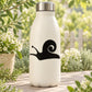 Snail sliding decal with black snail design on a white bottle