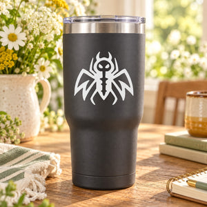 Abstract bee decal sticker: white bee-and-wings outline on dark tumbler