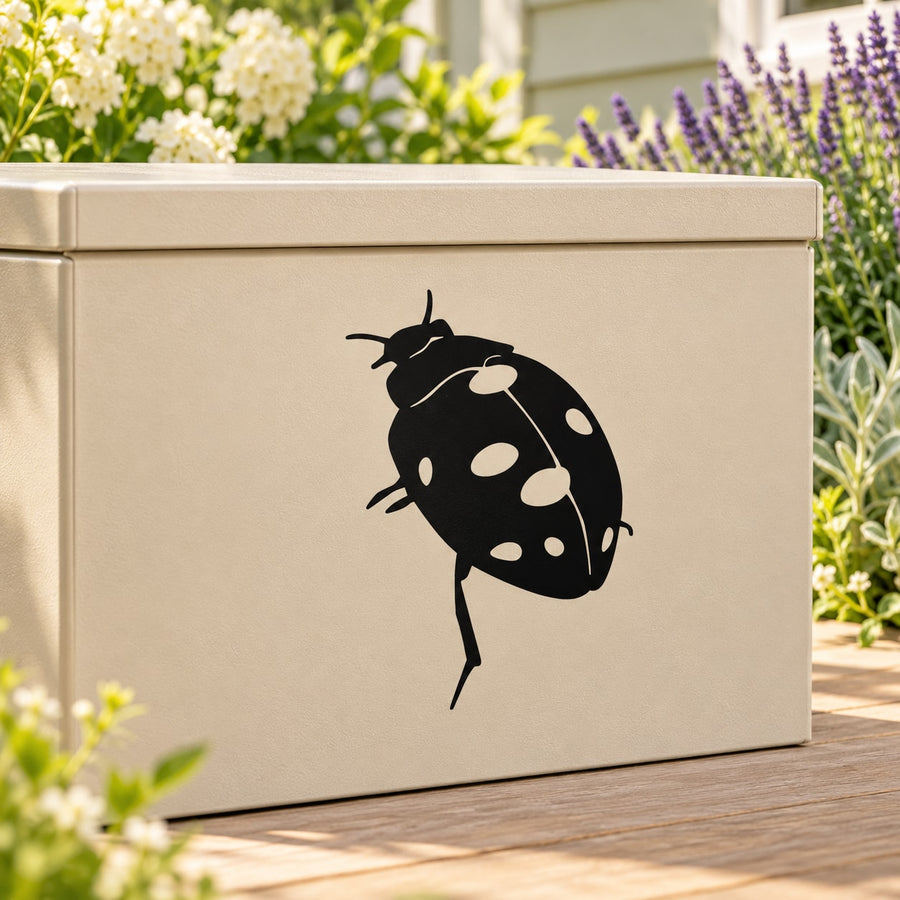 Ladybug wall climbing decal with black body and white spots