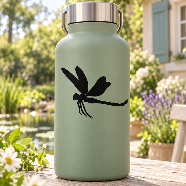 Dragonfly gliding decal: black dragonfly graphic on smooth matte surface