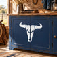 White bull skull decal with antlers on dark blue surface