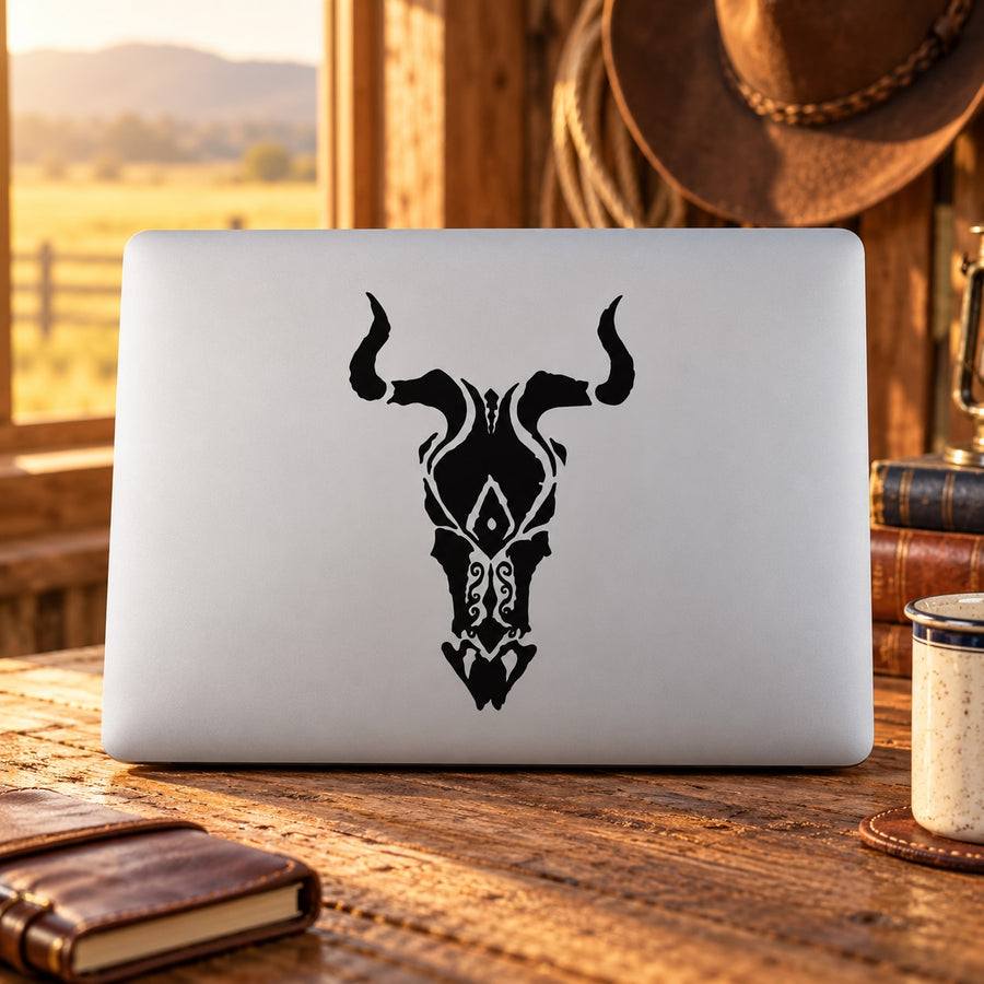 African art bull head decal, black graphic on a white rectangular backing