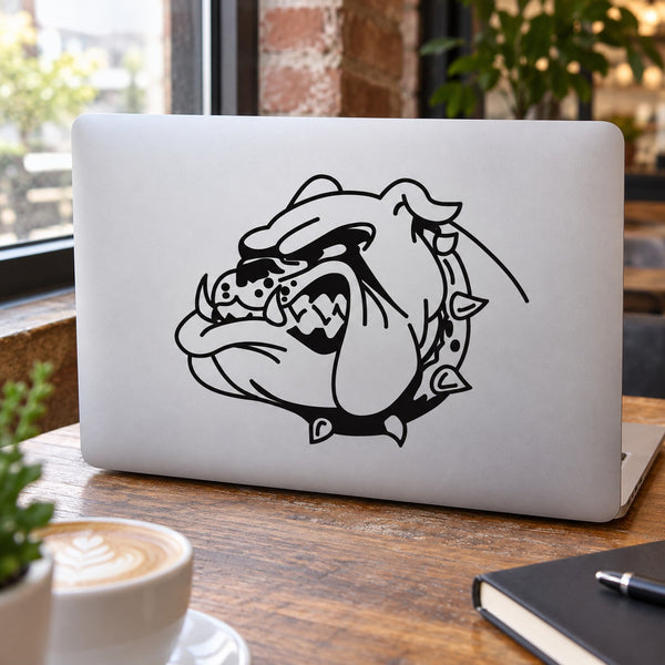 Bulldog head decal with black line art on a white laptop lid.