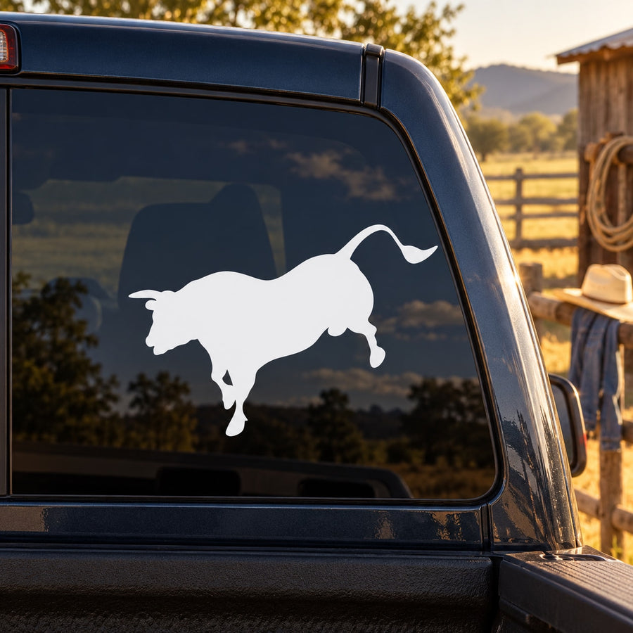 White bull silhouette decal on car window, chasing pose