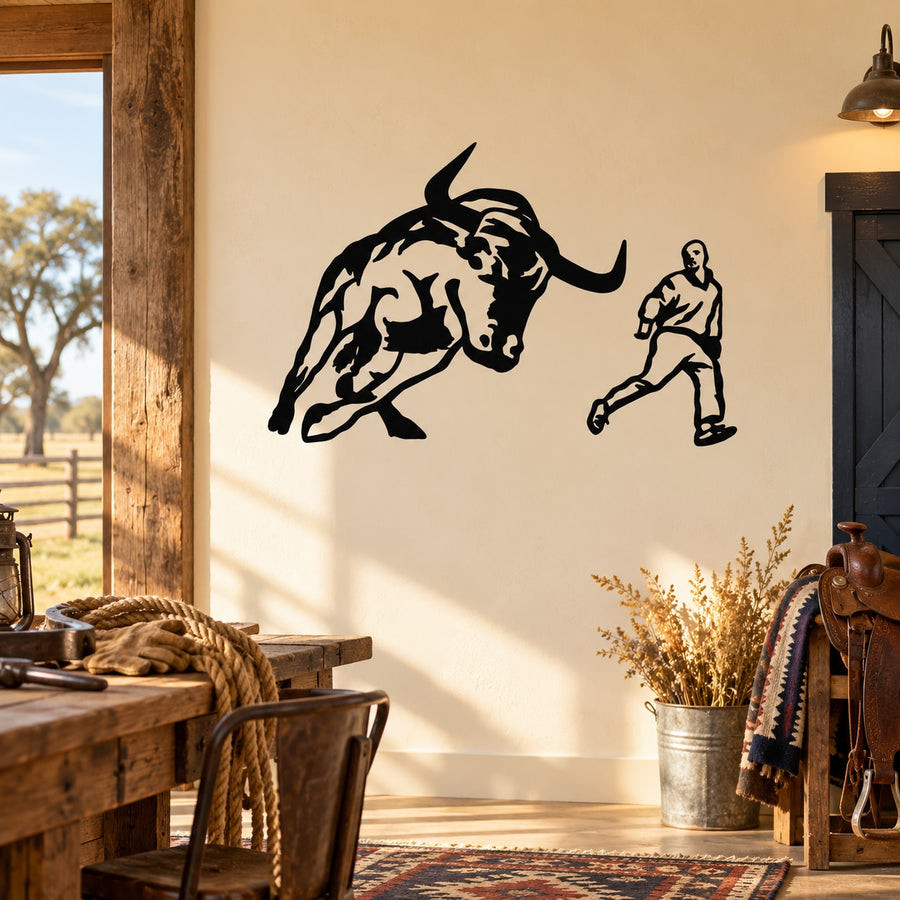 Black decal of a charging bull with a running man holding a club