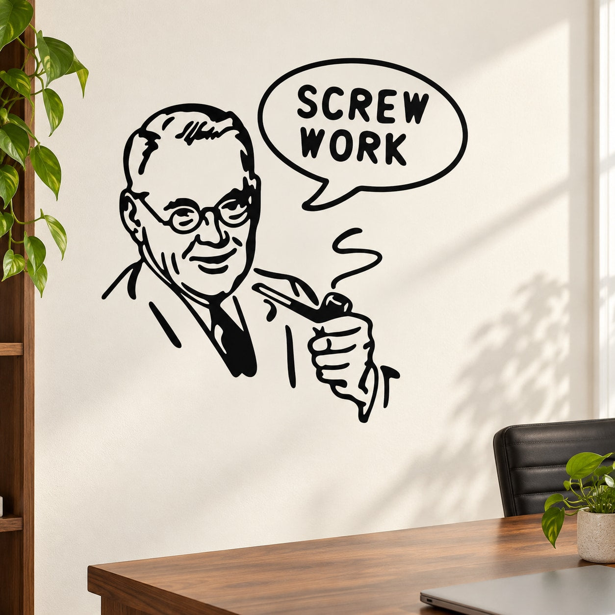 Black wall decal featuring a pointing face and speech bubble text “SCREW WORK”