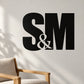 Black wall decal with large "S & M" lettering