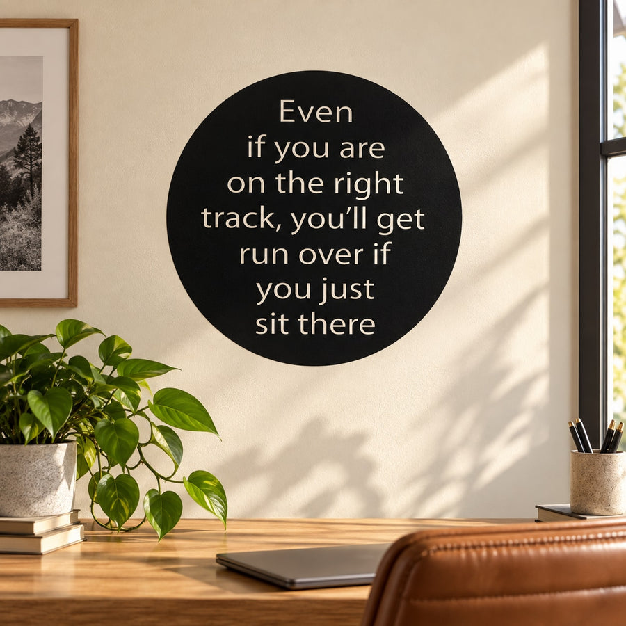 Round black wall decal with white inspirational quote text