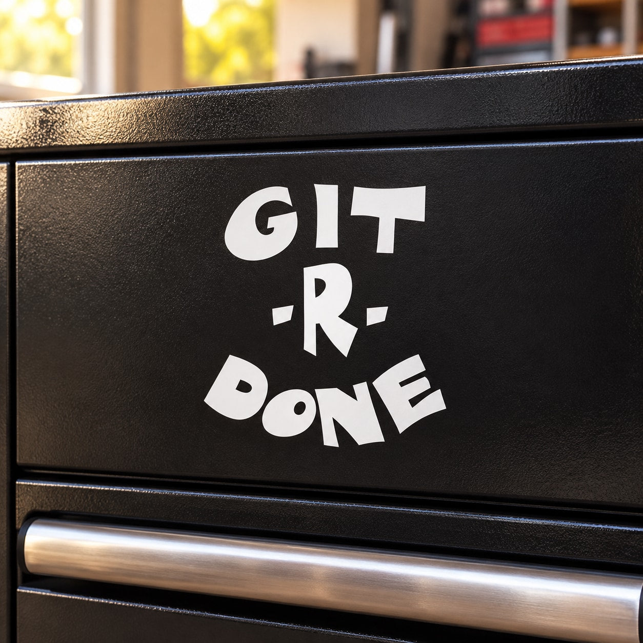 Vinyl decal with bold white "GIT R DONE" lettering on black background
