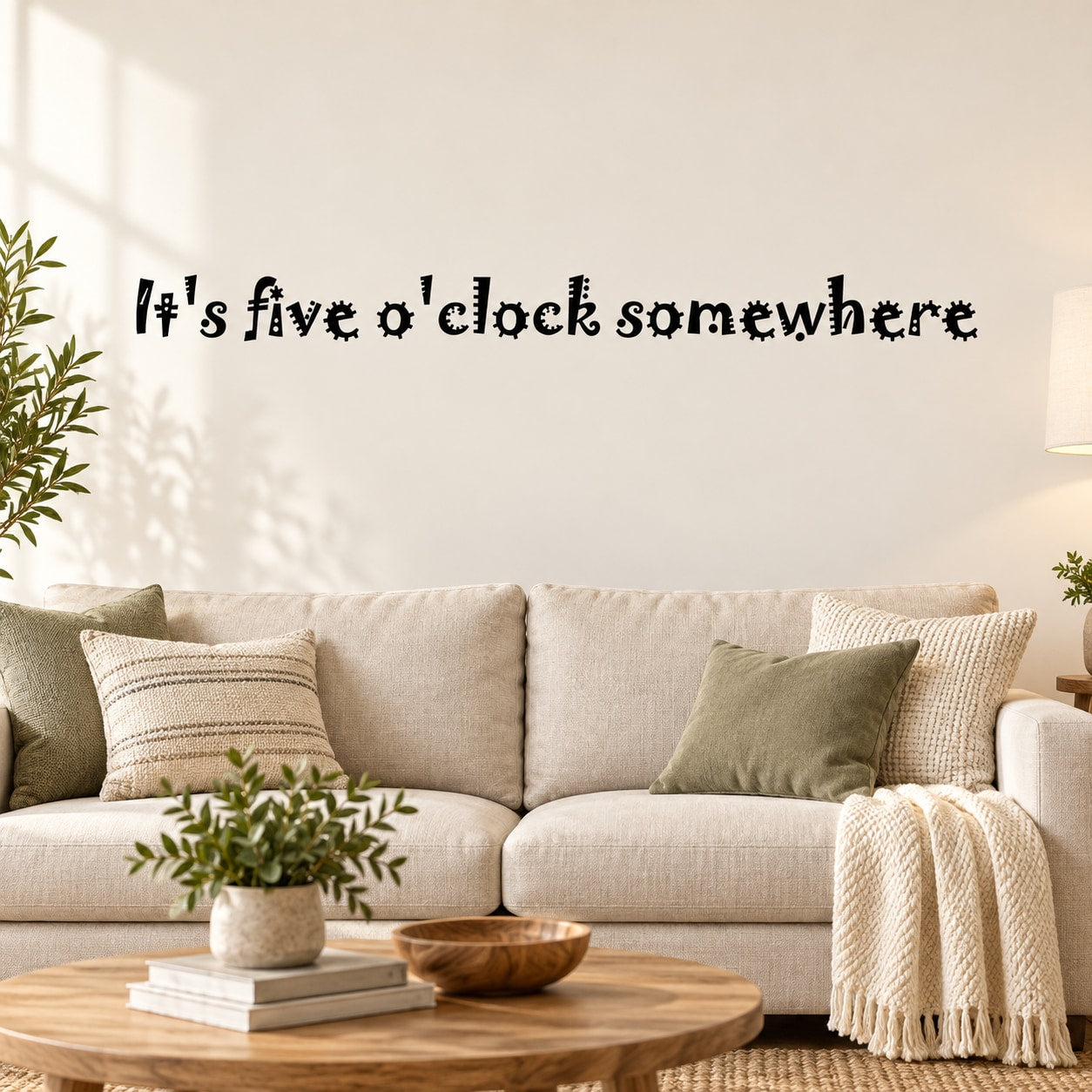Typography wall decal with “It's five o'clock somewhere” lettering.
