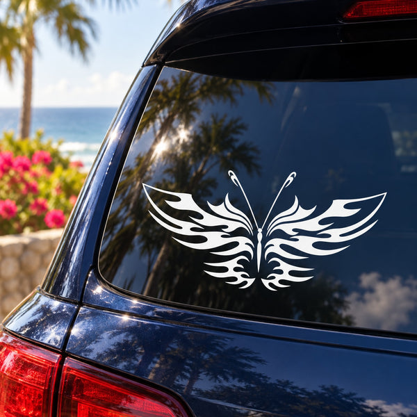 White butterfly wing vinyl decal on dark car window