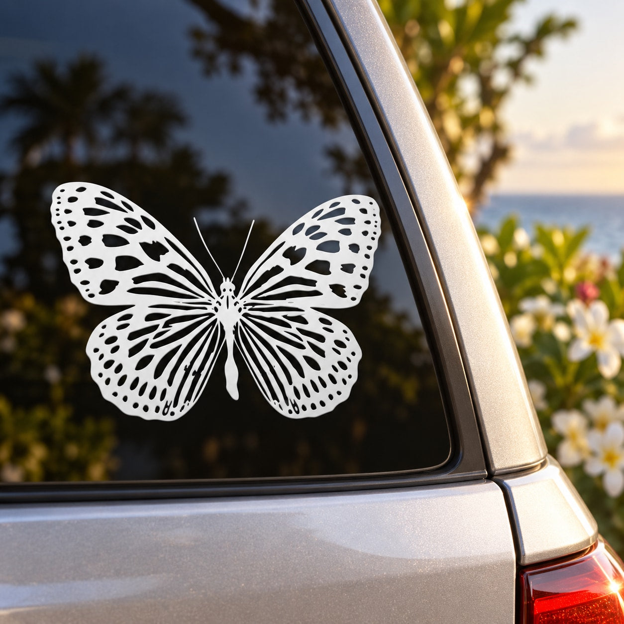 Detailed monarch butterfly decal, white butterfly with black spots on car window glass