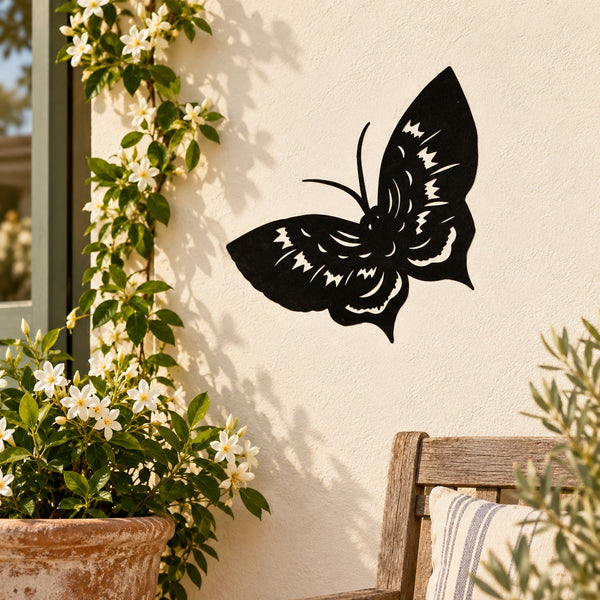 Black butterfly wall decal with long antennae, visible wing detail.