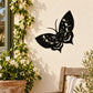 Black butterfly wall decal with long antennae, visible wing detail.