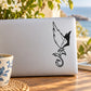 Black line-art eagle and butterfly landing on plant decal on a white surface