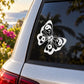 Butterfly decal with yin-yang wing pattern on car window
