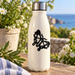 Butterfly vinyl decal, black butterfly outline on a white bottle