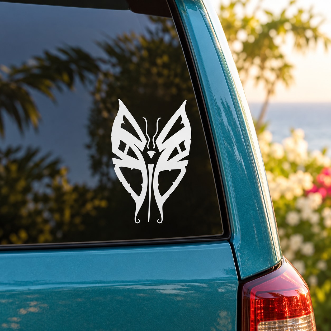 White butterfly vinyl decal on car window
