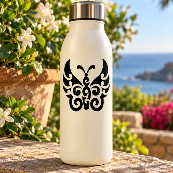 Black butterfly vinyl decal with ornate swirls on a white bottle