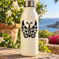 Black butterfly vinyl decal with ornate swirls on a white bottle