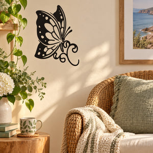 Black butterfly vinyl wall decal with white wing dots and curled antennae.