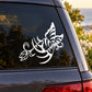 White butterfly vinyl car decal on car window with swirling floral accents