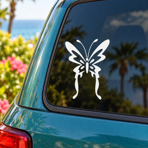 White butterfly vinyl decal on car window, decorative wings and antenna