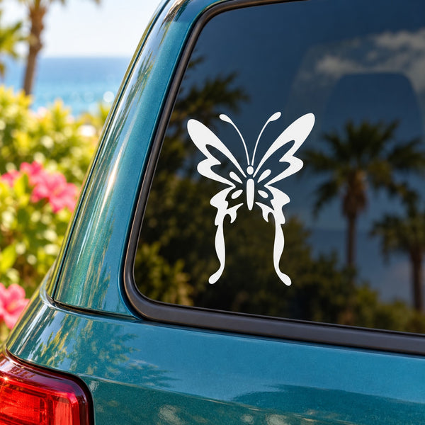 White butterfly vinyl decal on car window, decorative wings and antenna