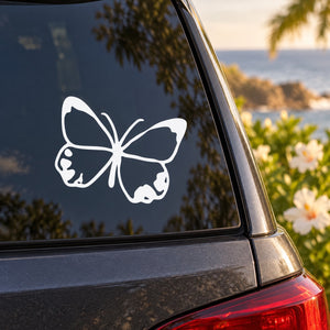 White butterfly vinyl decal on car window