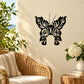 Black ornate butterfly vinyl wall decal with detailed swirls