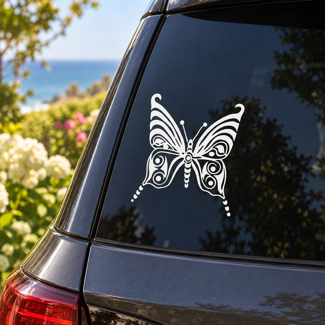 White butterfly vinyl decal with ornate wings for car window