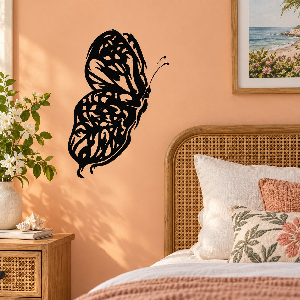 Butterfly wall decal with black vinyl silhouette on a smooth wall