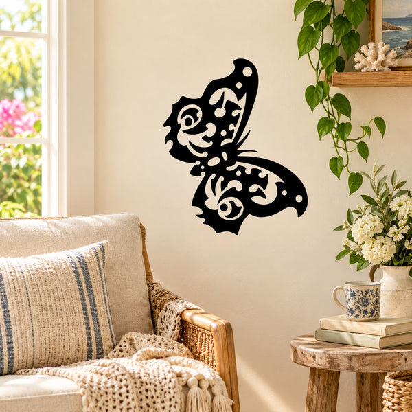 Black butterfly vinyl wall decal with decorative cutout pattern